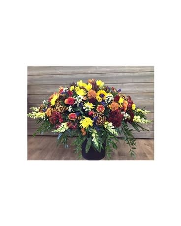 Falling Daisies Casket Cover Falling Daisies Casket Cover - 3/4 casket cover that includes beautiful autumn hues with sunflowers, fall daisies, mums, snap dragons, alstromeria, montecasino, purple status, safari sunset, gerber daisies and more... Flowers and colors may be substituted depending on availability adn season. FCF-SCC01