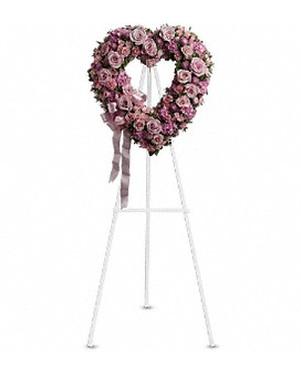 Rose Garden Heart - A tender and classic tribute to a precious life. Heartfelt emotions and sympathies find delicate expression here. Lovely flowers such as light pink roses hydrangea and miniature carnations mix with lavender button spray chrysanthemums. Approximately 18&quot; W x 19&quot; H Orientation: One-Sided   T238-2Aa