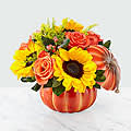 FTD Bountiful Bouquet - Our Bountiful Bouquet arranged in a pumpkin includes yellow sunflowers; orange roses; solidago; peach hypericum berries; accented with assorted greenery!!