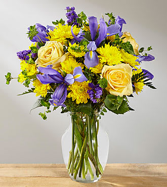 FTD Cottage View Bouquet - Our Cottage View Bouquet includes blue iris; yellow roses; yellow daisies; blue statice; bupleurum; accented with assorted greenery!!