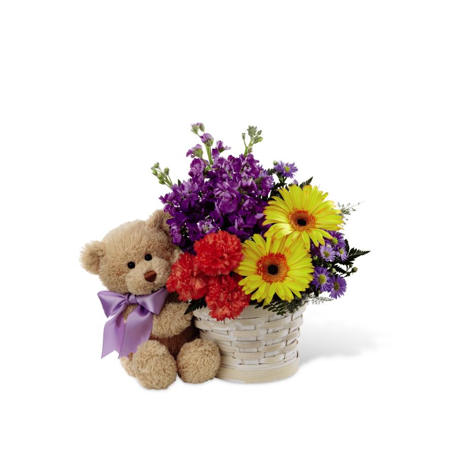 The FTD Best Year Basket - The FTD Best Year Basket, blossoming with gerbera daisies and stock,   conveys your wishes that this coming year be the best year yet! Purple   stock, orange carnations, yellow gerbera daisies, purple monte casino   asters and lush greens are gorgeously arranged in a whitewash woodchip   basket hugged by a sweet 10-inch seated plush bear tied with a lavender   ribbon around the neck. Full of color and exuding a soft fragrance, this   bouquet creates an exceptional birthday gift they are sure to love.   GOOD bouquet includes 10 stems. Approx. 13H x 10W. BETTER bouquet   includes 14 stems. Approx.  15H x 12W. BEST bouquet includes 19 stems.   Approx. 17H x 15W.   &quot;