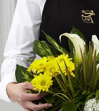 FTD Florist Designed Blooming and Green Plants in a Basket - EO-6059  Can't decide which plant to send? Let our florist design something special with their most beautiful blooming and green plants in a basket. The combination will make a lovely presentation - appropriate for any occasion!