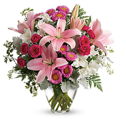 Blush Rush Bouquet Blush Rush Bouquet - This pretty bouquet features hot pink spray roses, pink asiatic lilies, white alstroemeria, pink matsumoto asters, seeded eucalyptus, leatherleaf fern, dusty miller, and pitta negra. Arranged in a clear, ginger jar vase and available for same day delivery to most Denver locations.