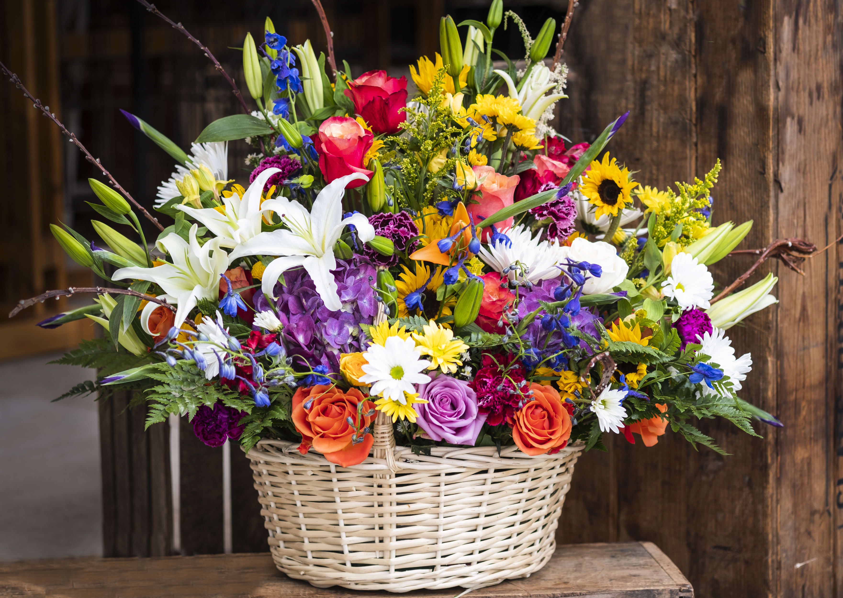 Colorful Funeral Basket by Gallea s Greenhouse Florist