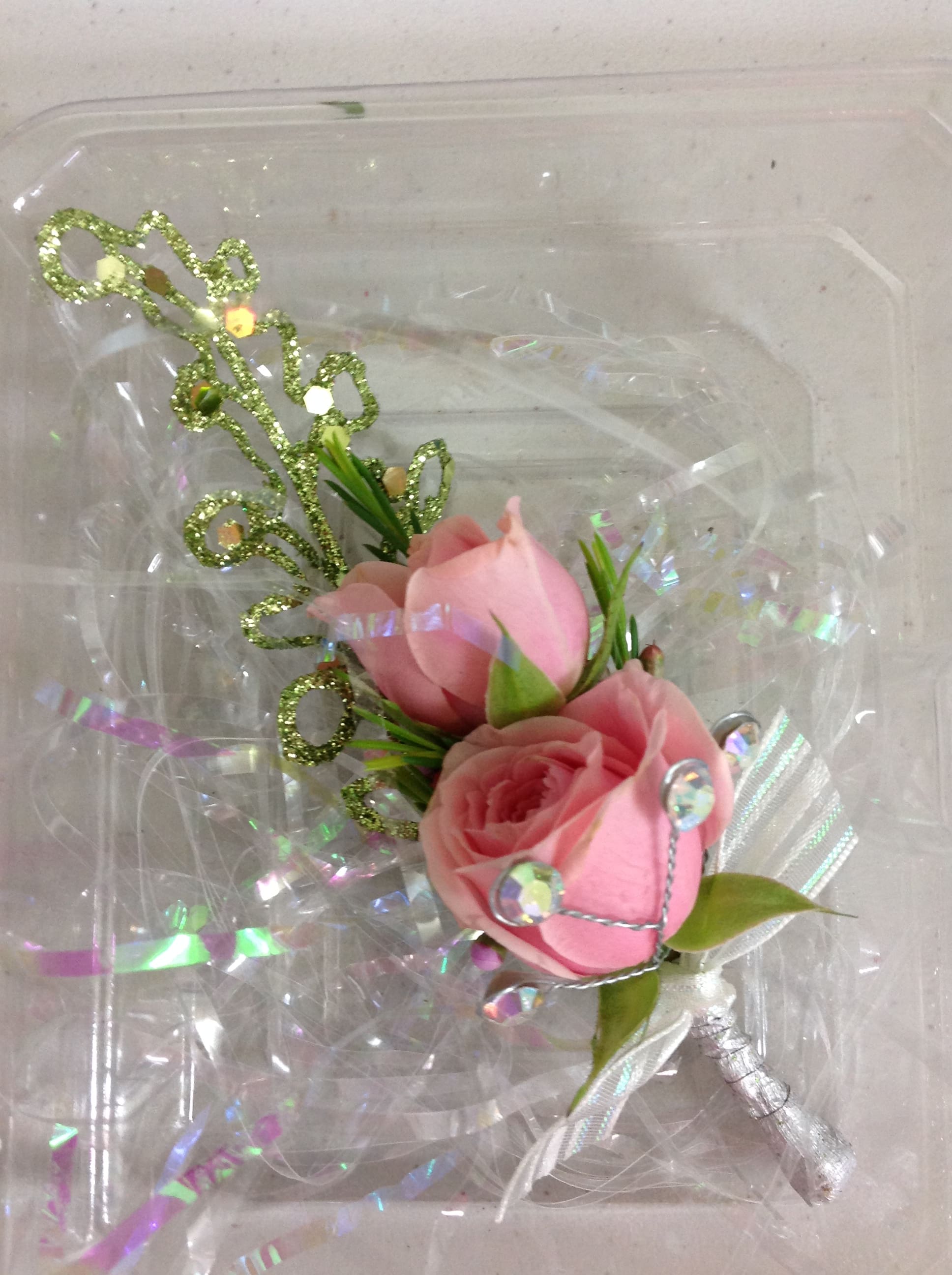Elegant Rose Boutonniere - Pink Spray Roses with Magnetic Attachment and green sparkle leaf makes this boutonniere a perfect show stopper for your occasion.  This can be made in any color.  Please specify if you wish to have this made in another color scheme.