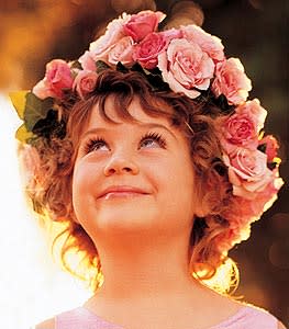 English Rose Headpiece - The perfect look for a fairy sprite nestled in an English rose garden. Three varieties of pink roses adorn your flower girlâs pretty locks.