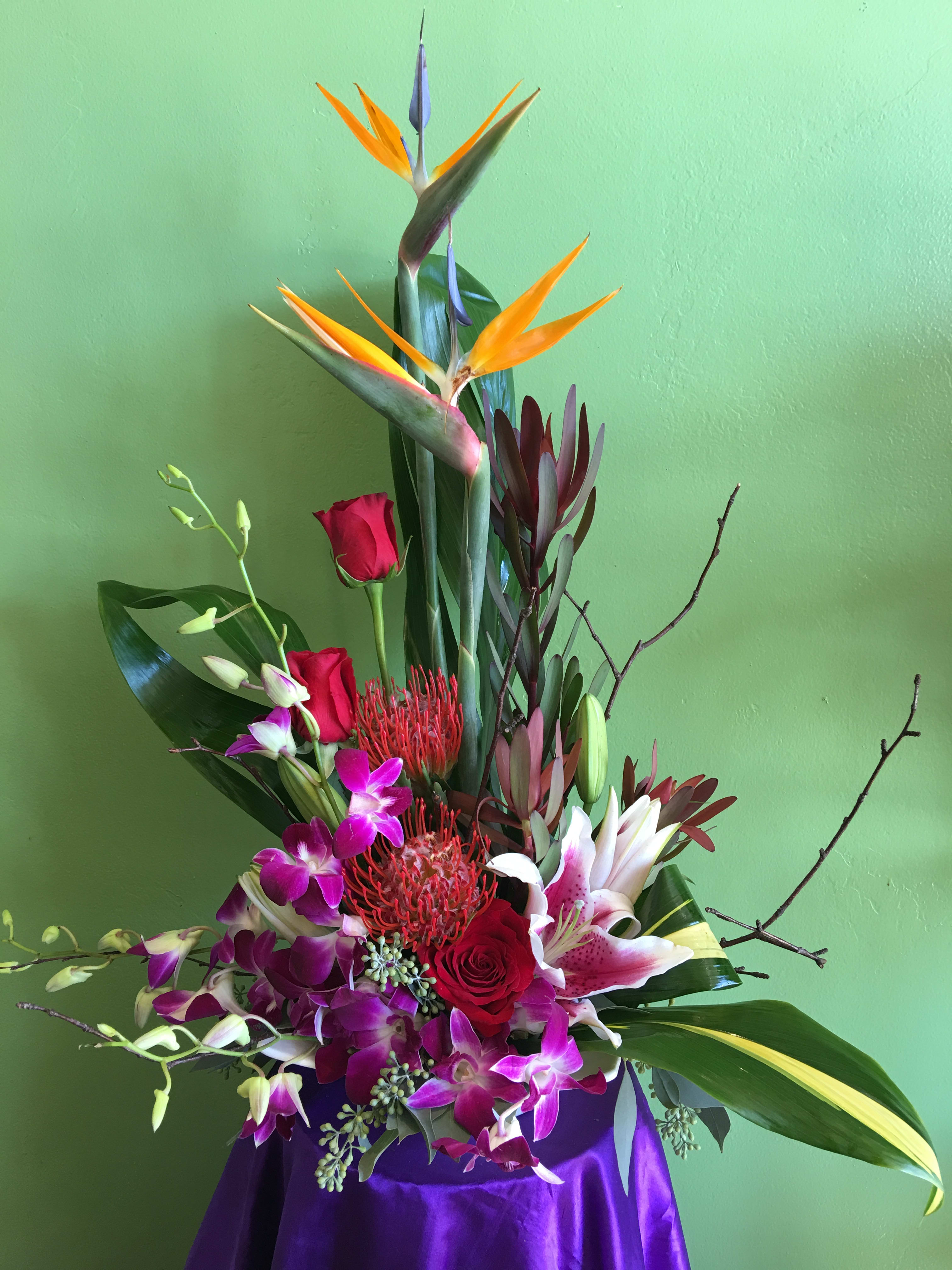 Just beautiful - An artistic high style design by Liz.  This beautiful arrangement will definitely bring a Wow smile to your special ones!