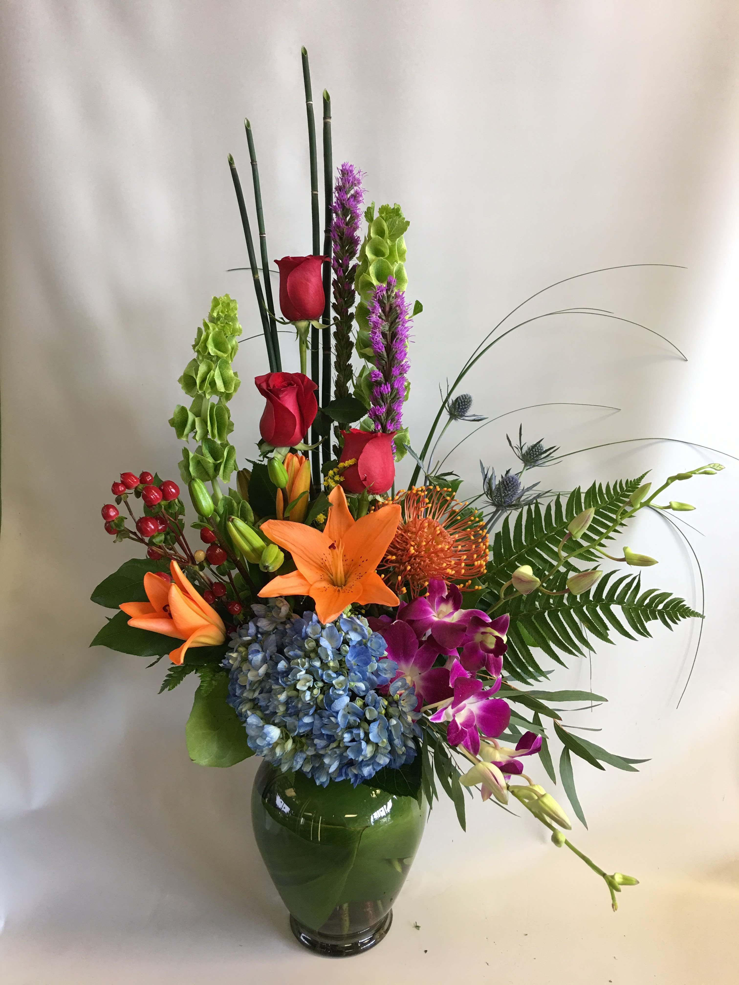 Zen Paradise  - A modern mixed of lilies, protea, roses and hydrangea in Zen's style.  
