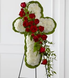 Floral Cross Easel Floral Cross Easel - Traditional cross with a rose cascade. Script can be added to this piece. Appox. 38"h x 24"w