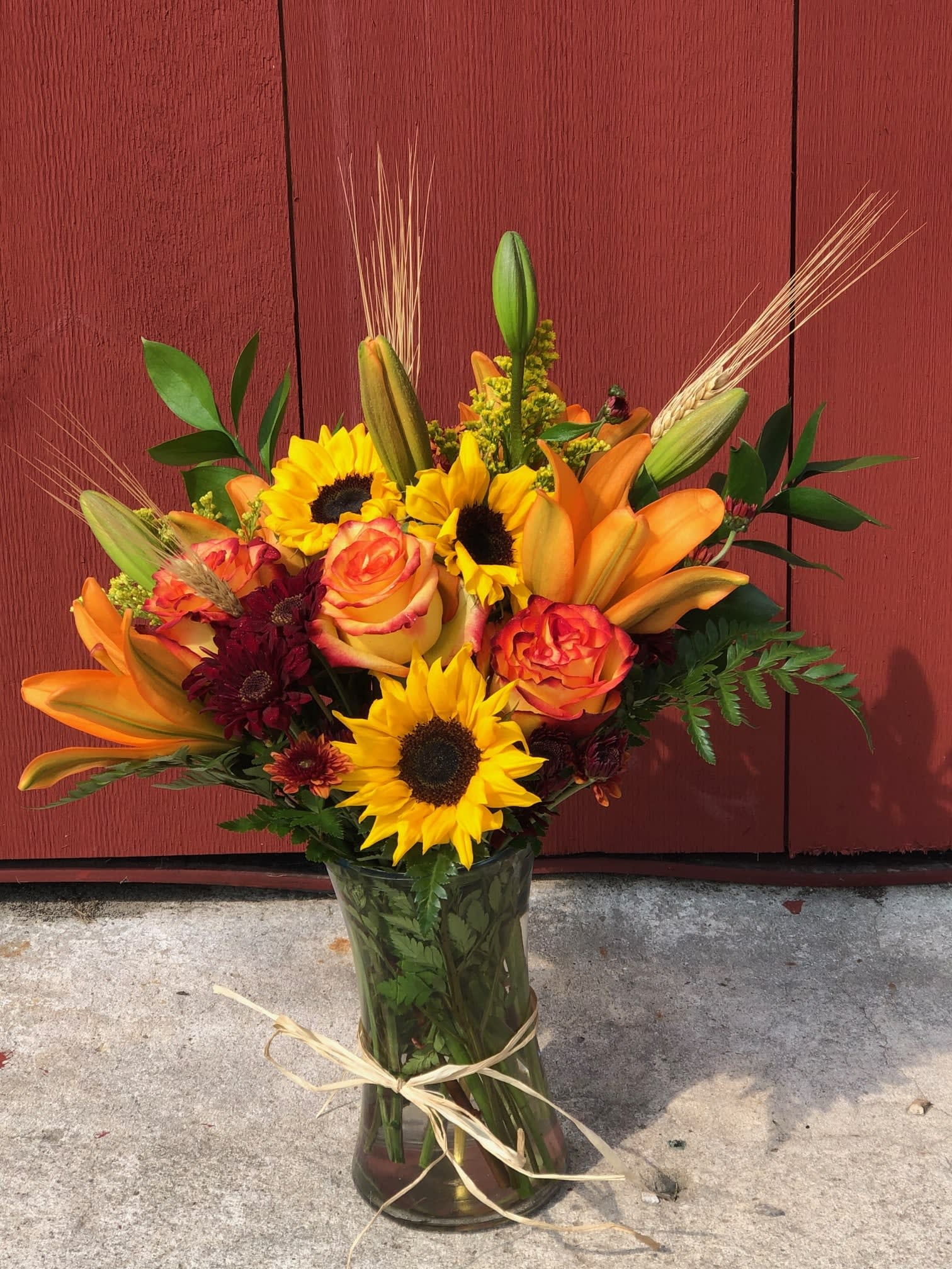 Harvest Love Harvest Love - A beautiful fall arrangement of sunflowers, roses, mums and lilies will make anyone smile.
