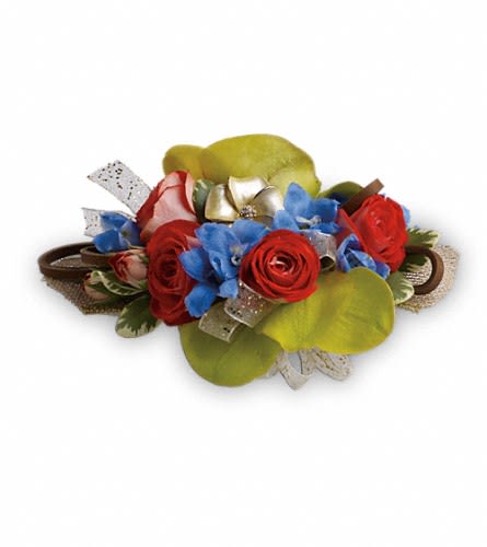 Barefoot Blooms Corsage - Green orchids orange roses and a pop of bright blue delphinium color your night magnificent. Green vanda orchids orange spray roses and light blue delphinium tied with a leather cord.Approximately 5&quot; W x 3 1/2&quot; H Orientation: N/A As Shown : TPR04-2A