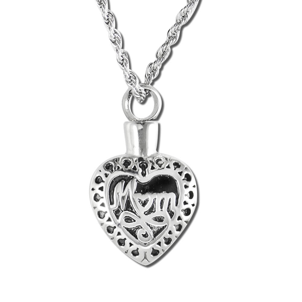 Stainless Steel Cremation Urn Pendant Heart-Mom with Chain - Simple, yet elegant. High quality stainless steel cremation urn pendant. Threaded at top, holds a very small amount. Supplied with a 20″ chain and velvet gift box. Dimensions: 1 1/4″ L x 3/4″ W x 1/4″ D   