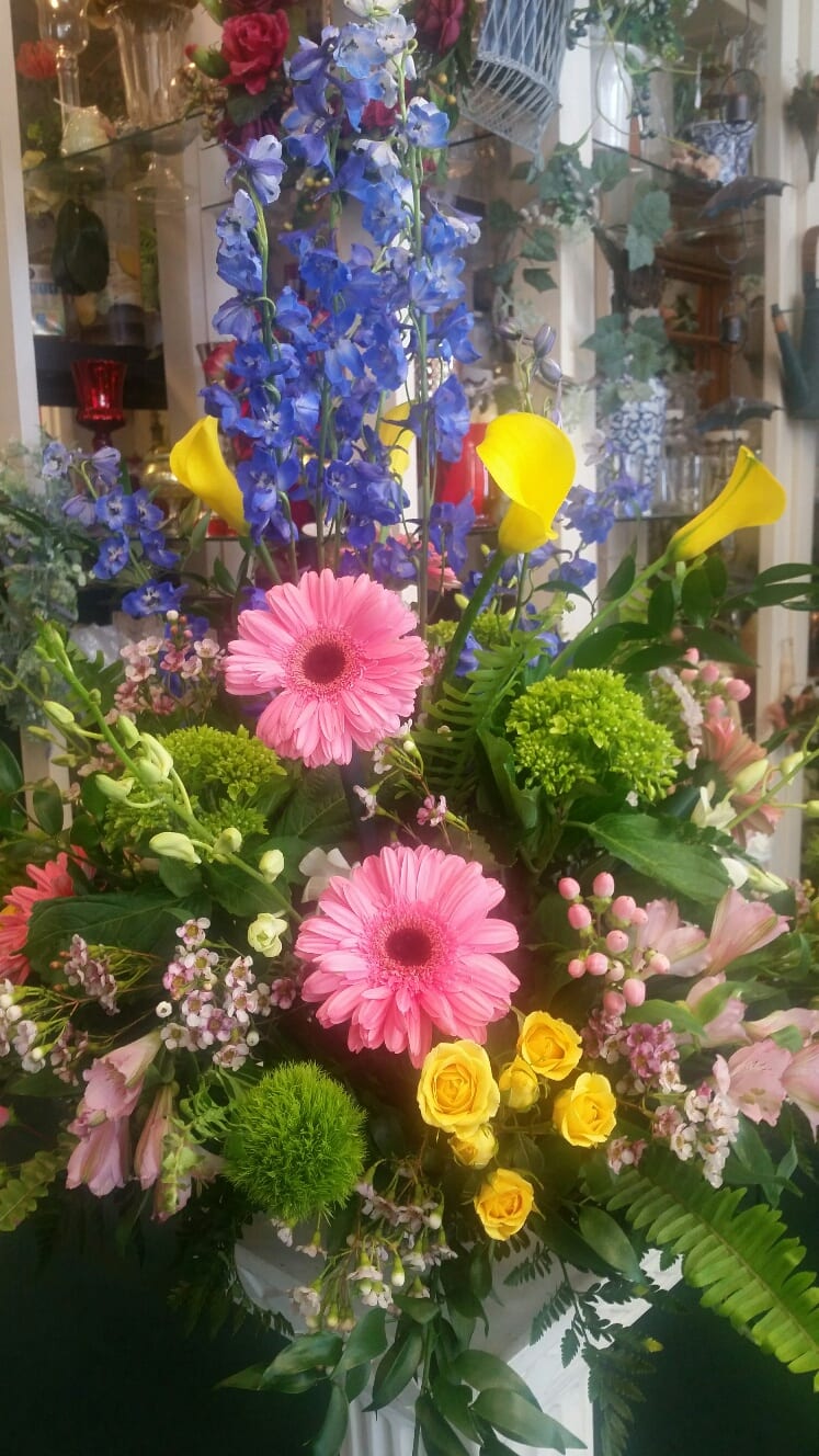 Garden Party Bouquet - Garden style arrangement of hydrangea, gerbers, delphimium,  mini callas, spray roses, wax flower, coffee berry and other mix spring flowers