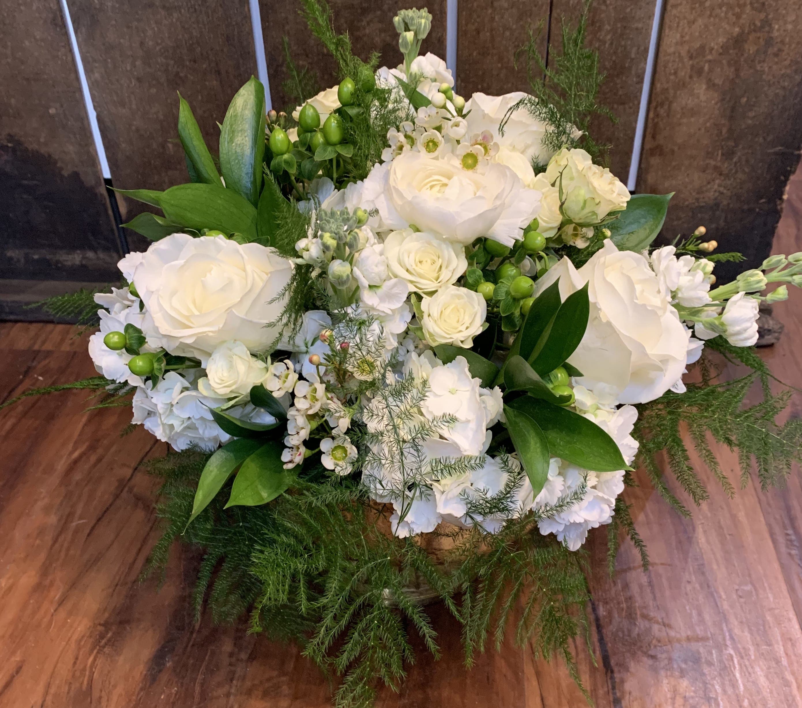 Elegant Whites - Greens and white elegantly arranged in a pedestal vase  