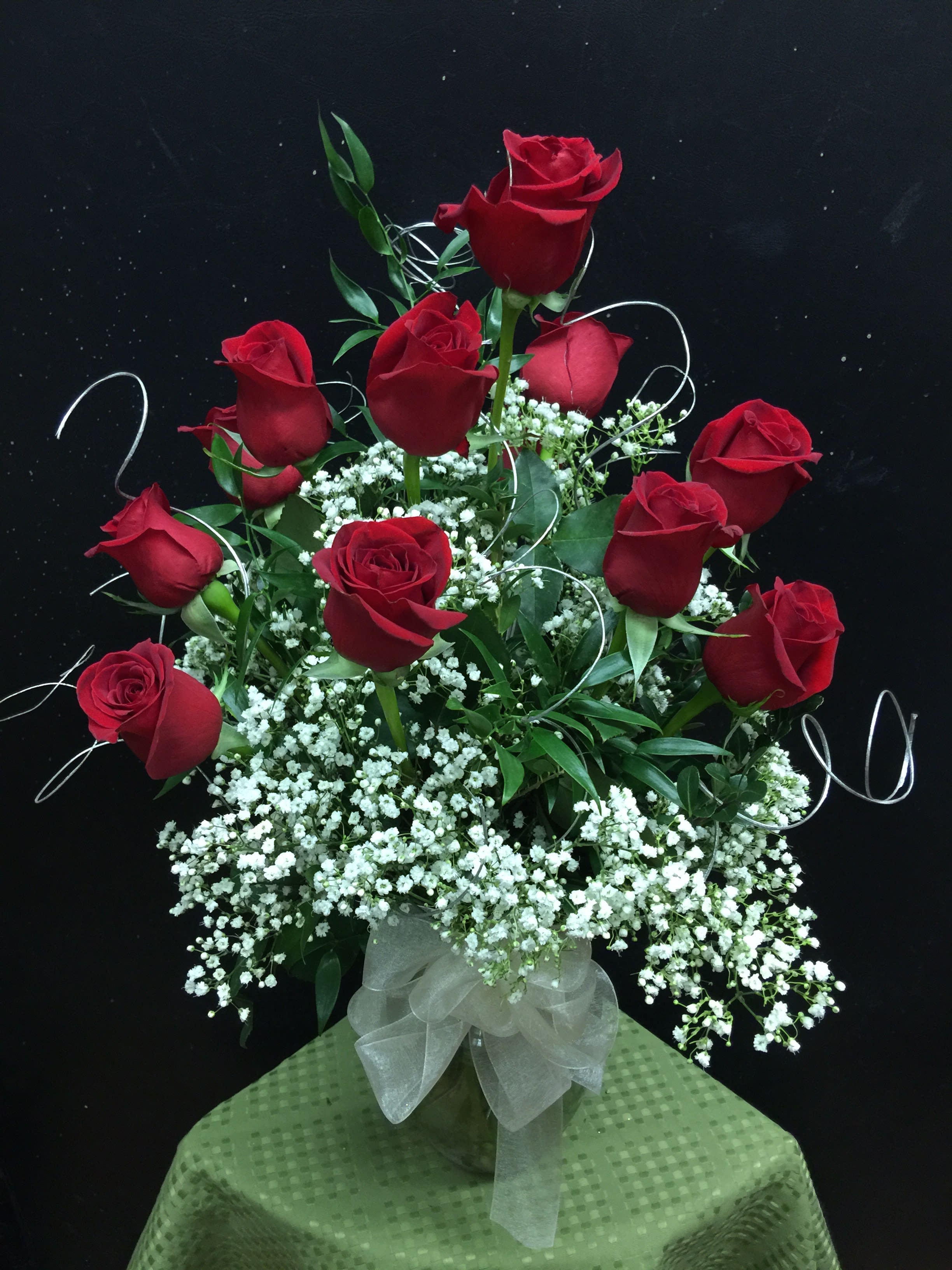 Dozen Long Stem Red Roses Arranged In A Vase With Baby S Breath And Fern By Flowers Unlimited