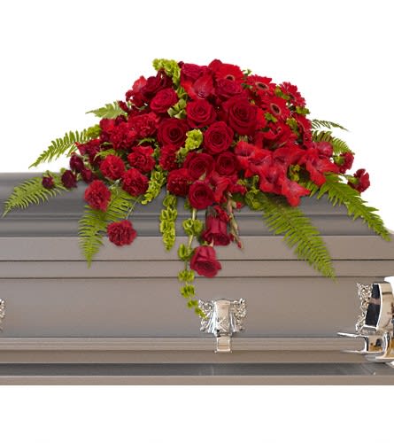 Red Rose Sanctuary Casket Spray - T230-3A - A gorgeous mix of dazzling red flowers will make a grand yet graceful impression. Beautiful red roses spray roses gerberas gladioli and carnations along with vibrant green bells of Ireland create a sincere tribute.Approximately 40&quot; W x 27&quot; H Orientation: N/A As Shown : T230-3A