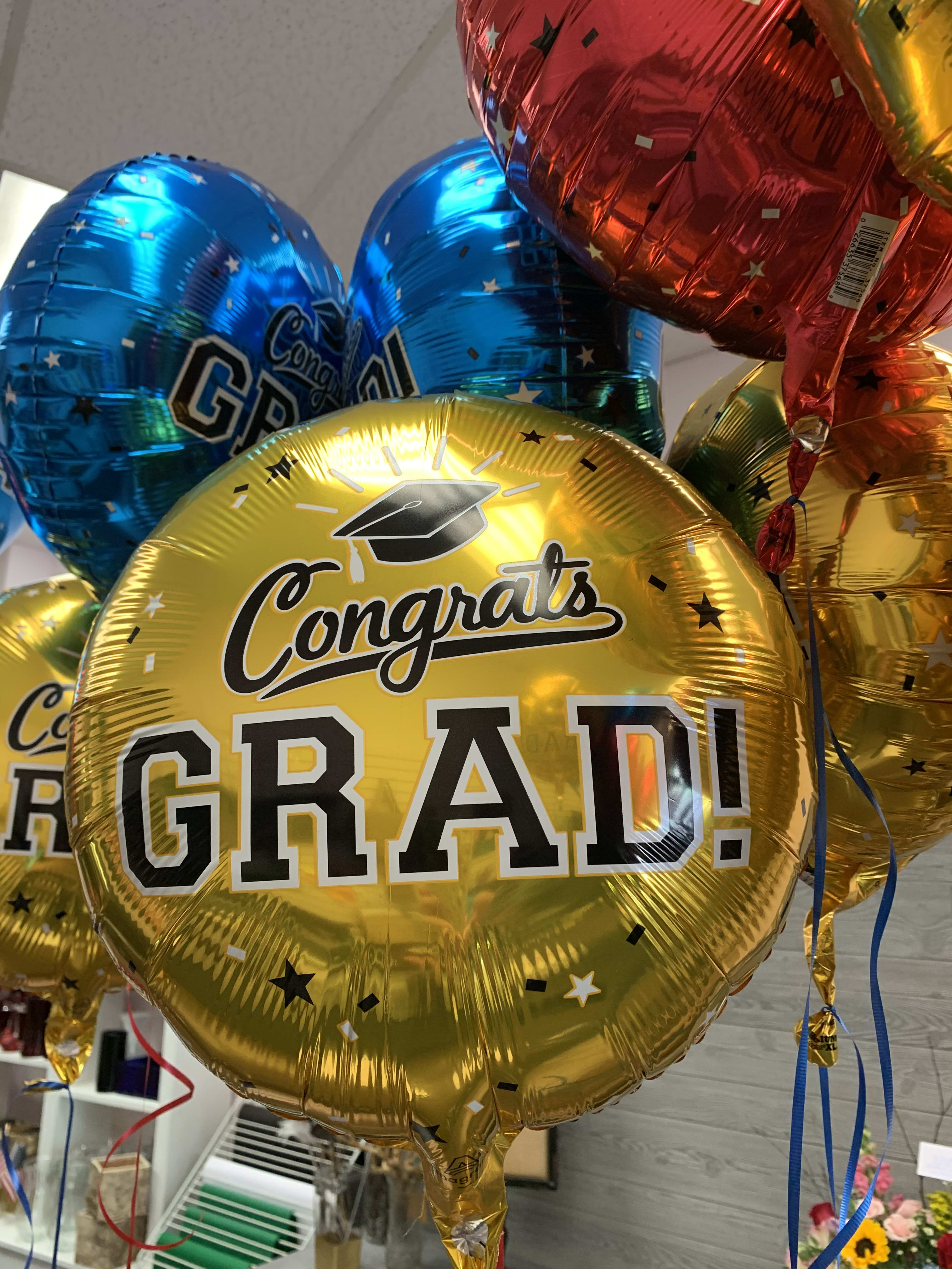 Graduation Mylar Balloons - What can be more festive than balloons? Add a balloon or a bouquet of balloons to your graduation party or gift. It will liven the party for sure!