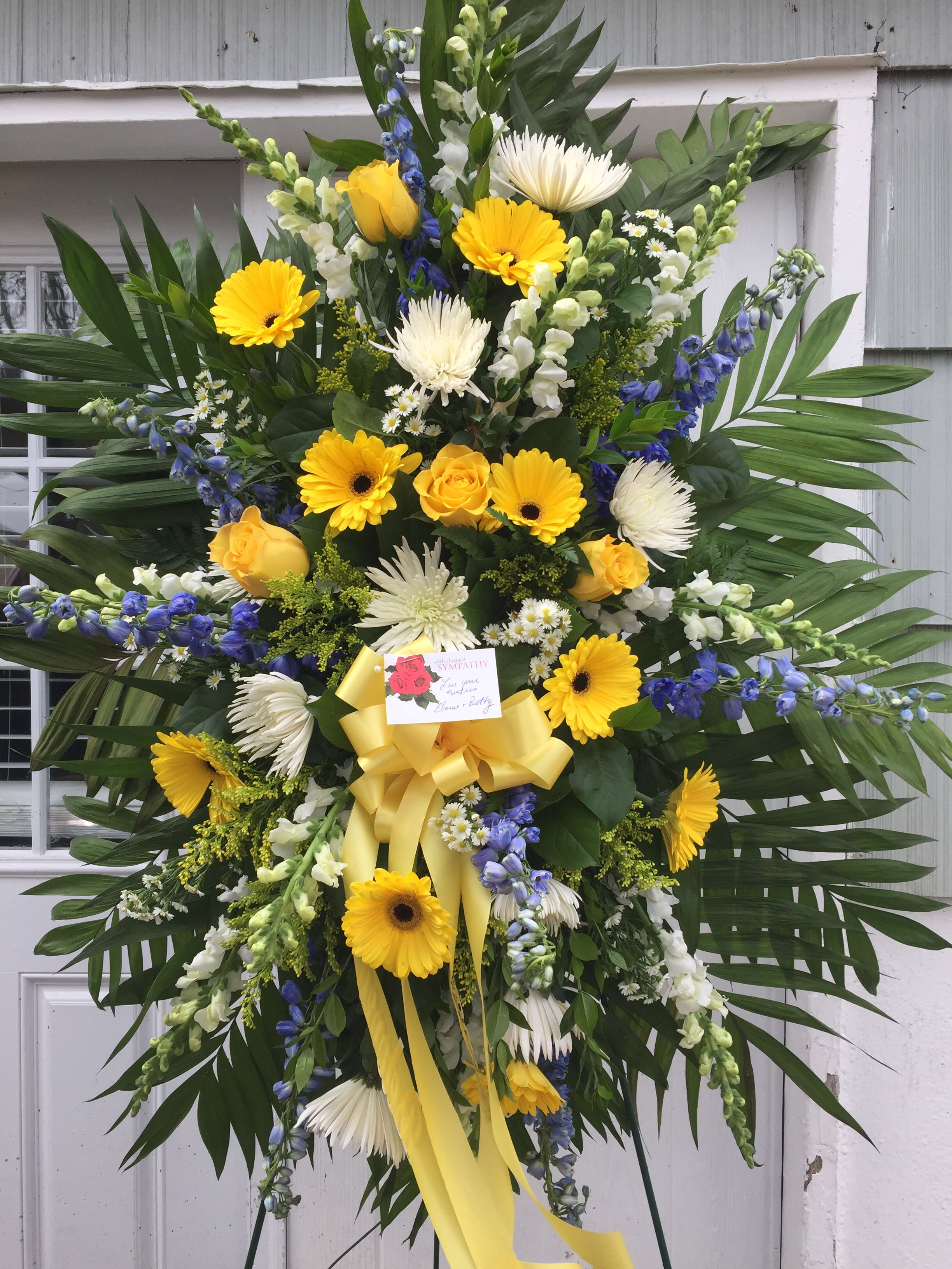 Standing Spray White Yellow Blue By Landmark Florist