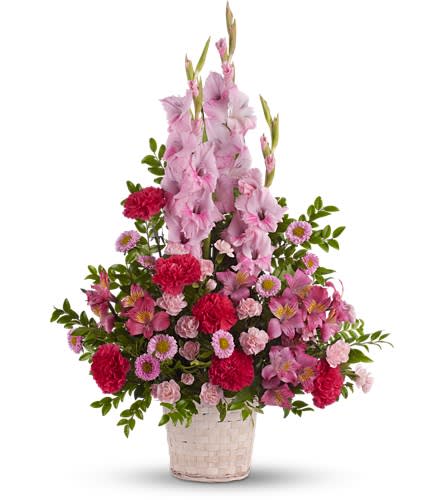 Heavenly Heights Bouquet - Beautifully feminine. Serene but strong. This pretty basket of pink flowers is a lovely way to show you care. A mix of fresh pink blossoms like gladioli alstroemeria carnations and more are lovingly arranged in a white basket.Approximately 23&quot; W x 33&quot; H Orientation: One-Sided As Shown : T221-4A