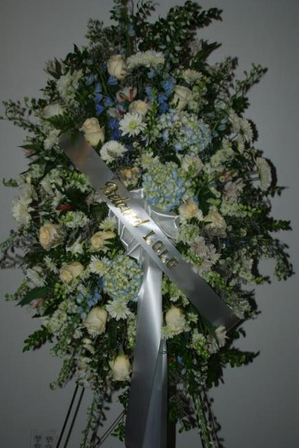 Standing Hydrangea Easel  - Large standing easel full of hydrangeas, daisies, roses, and other plants.