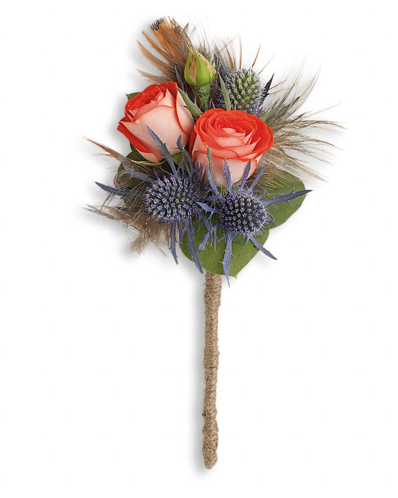 Boho Dreams Boutonniere Boho Dreams Boutonniere - This exotic mix of blue eryngium and pheasant feathers is sure to turn heads. Orange spray roses, blue eryngium and seeded eucalyptus with pheasant feathers.