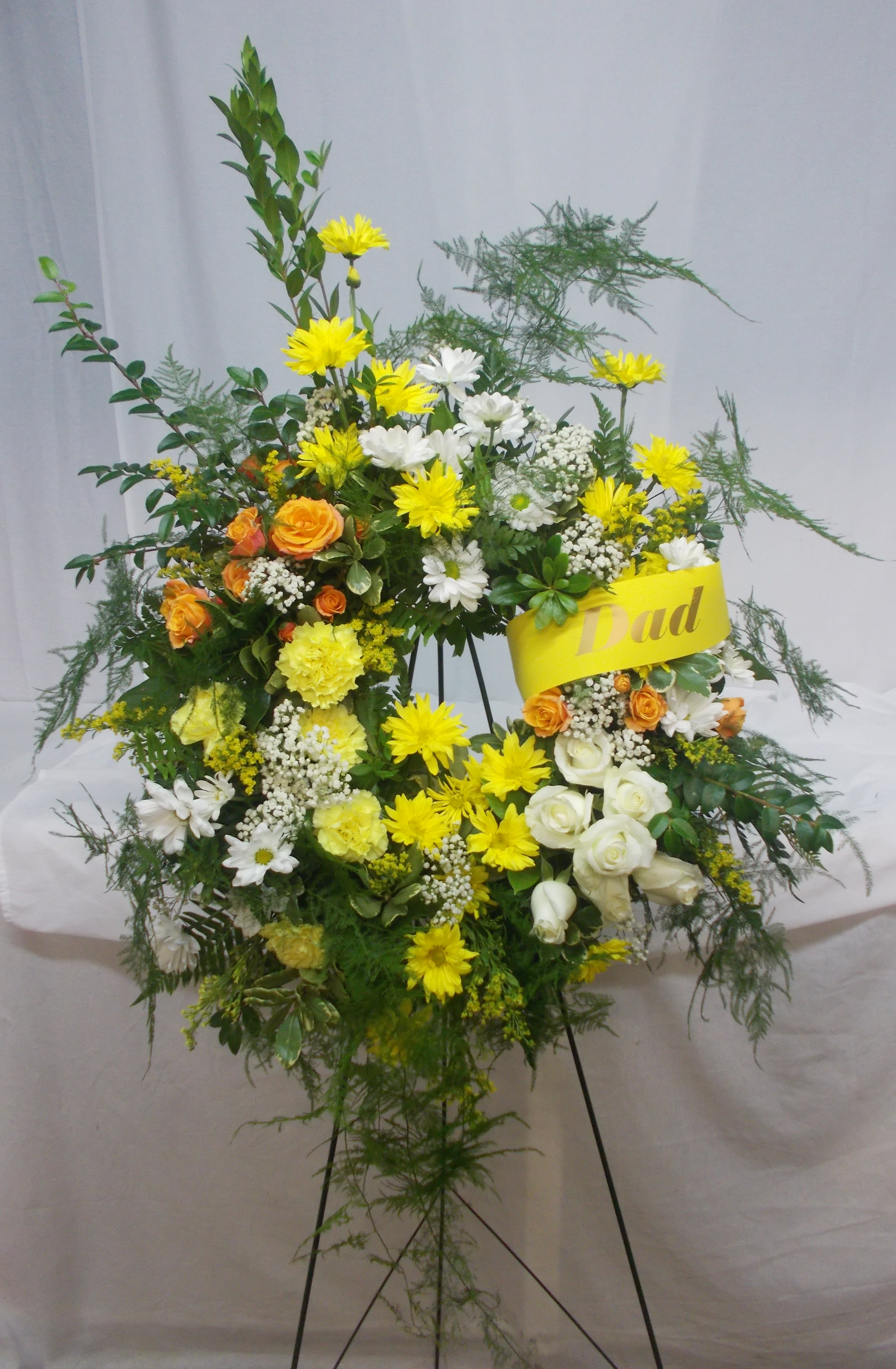Meadowland Wreath (Item WSR 96-1000) Meadowland Wreath (Item WSR 96-1000) - A special tribute to bright and happy days shared together, and fondly remembered forever.