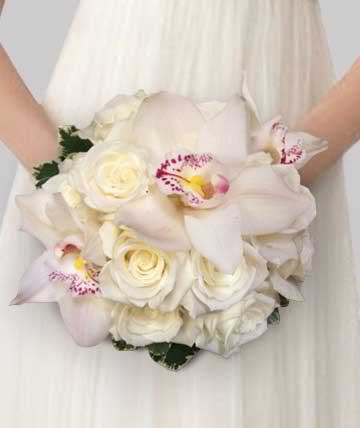 Orchid &amp; Rose Bridal - Rose clutch studded with three beautiful cymbidium orchids.  Substitutions of equal or greater value may be made depending on season and availability of product or container. 