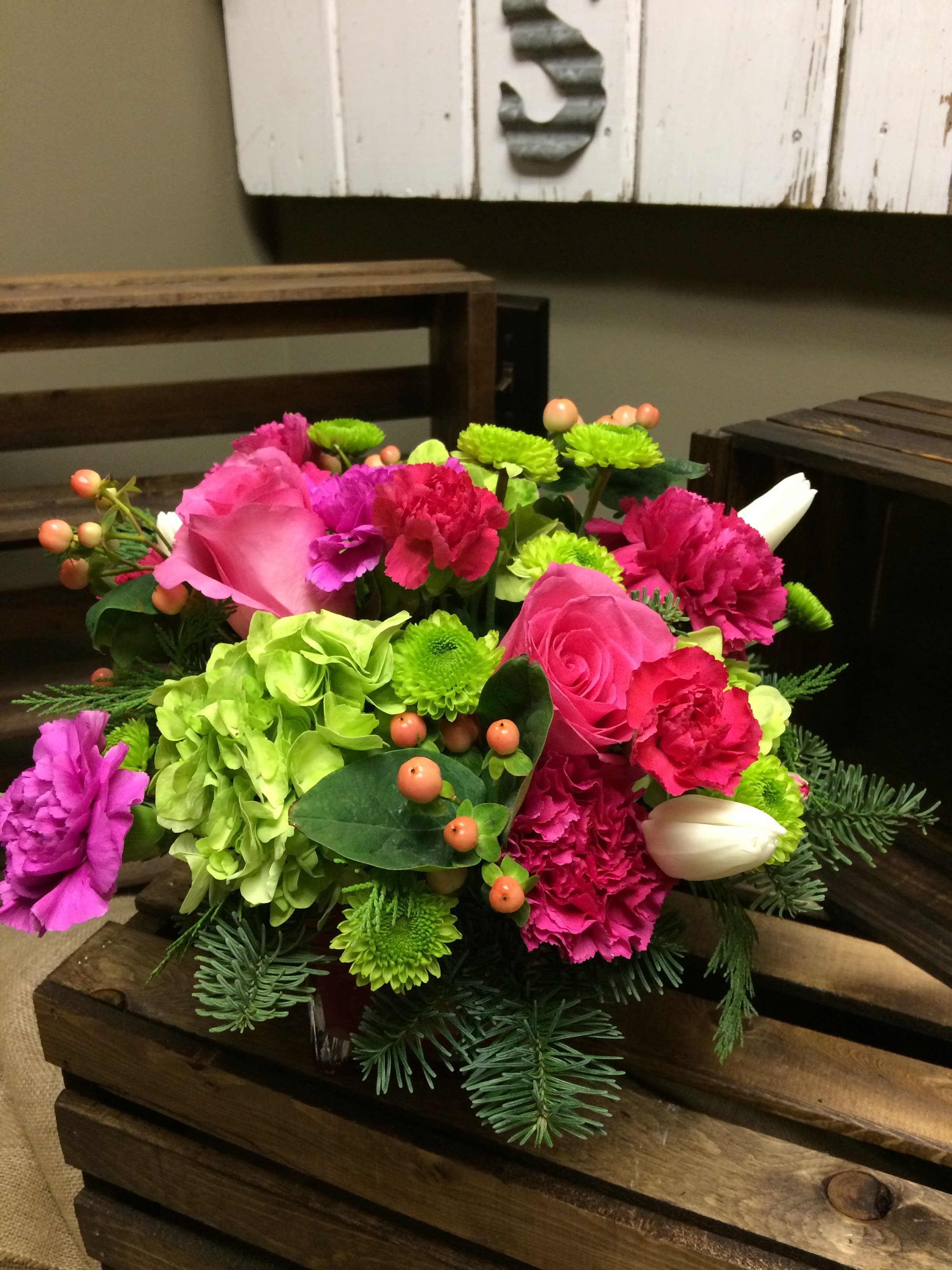 Beautifully Bright ! custom design by Cold Spring Floral - A beautiful bright, colorful, custom design with green hydrangea, green kermits, pink roses, violet carnations, peach hypericum berry, and white tulips arranged in a lush bed of greens