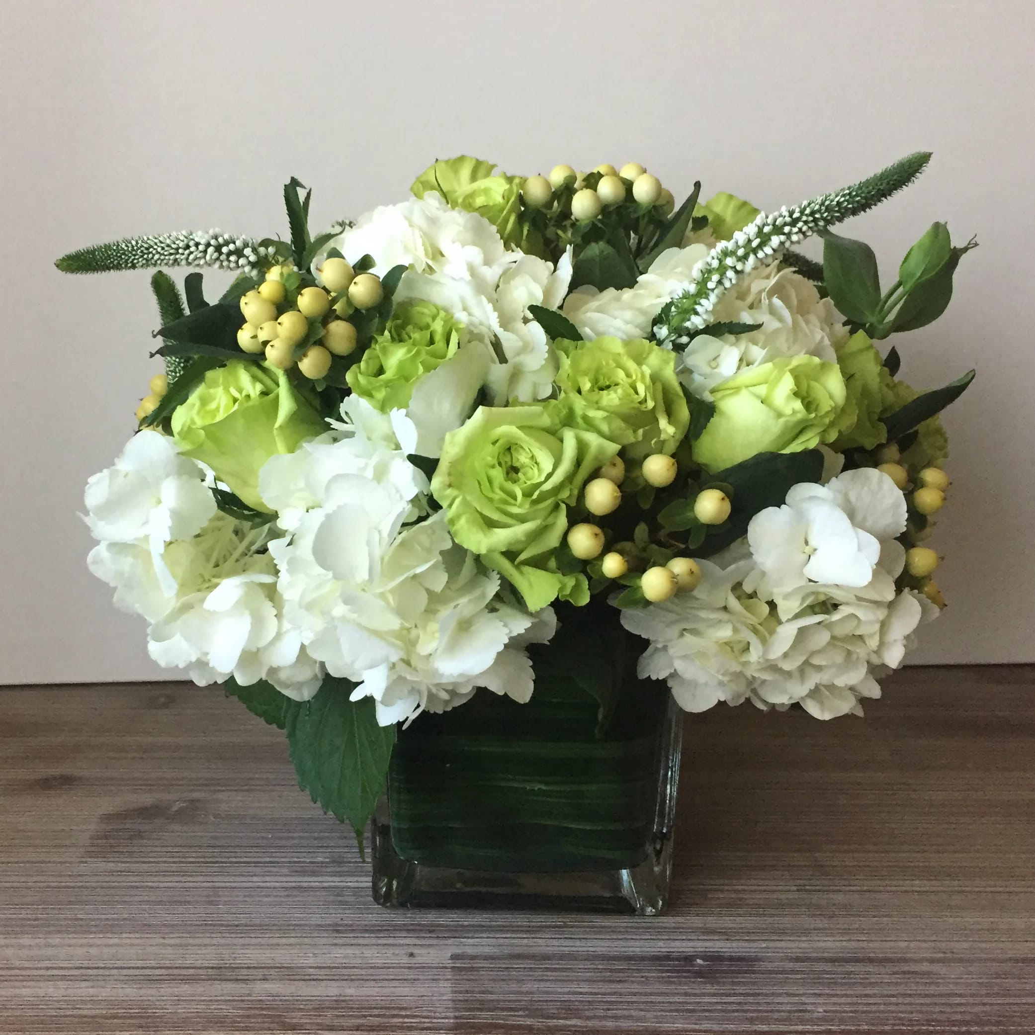 White hydrangeas mixed with green roses, veronica and berries in Washington, DC Shoots and