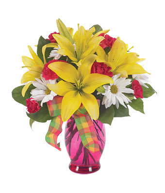 Sunny and Bright - Send cheerful sentiments with this vibrant arrangement of mini carnations, lilies and daisy poms in a delicate pink fluted vase, accented with a bright fruit punch ribbon. Measures 14&quot;H by 10&quot;L.