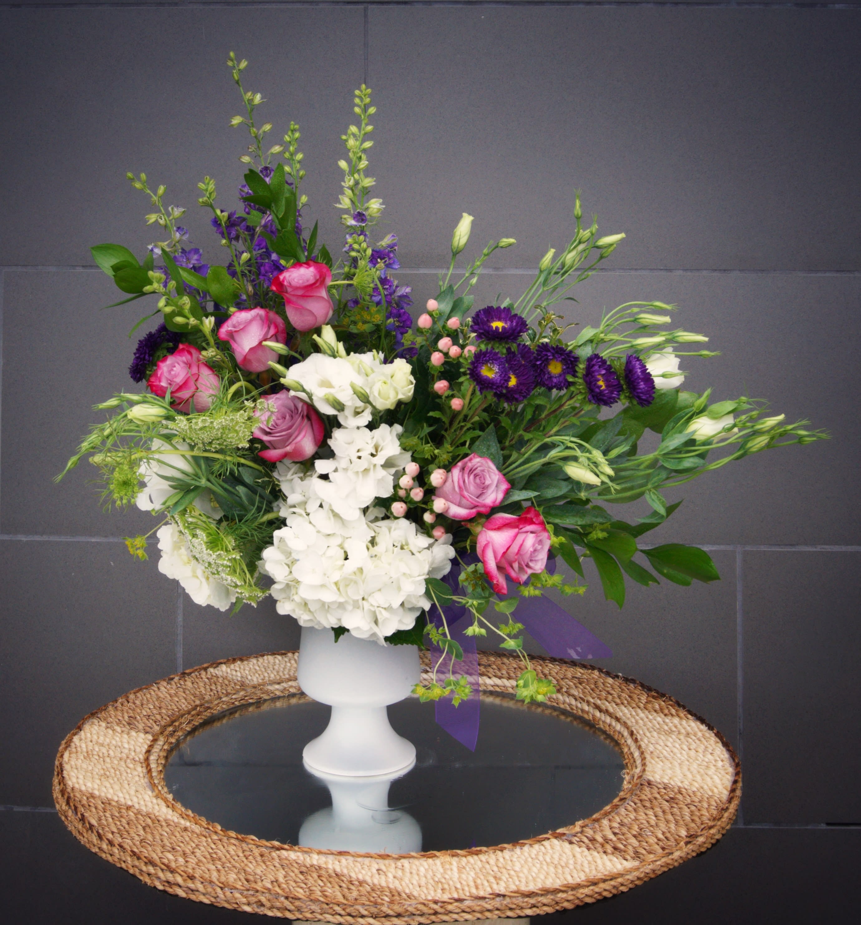 Stunning Beauty - Beautiful English style with all premium fresh flowers: rose, lisianthus, mashumoto, larkspur, hydrangea... and accents in a nice container.