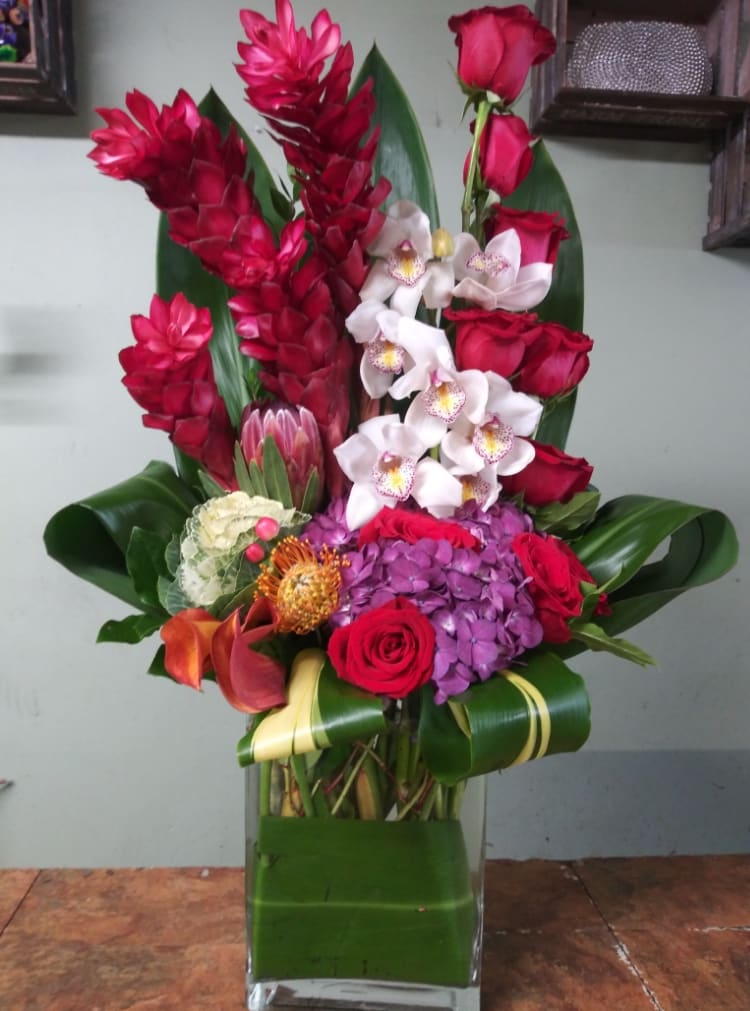 Pacific Paradise Pacific Paradise - Cymbidium orchids, gingers, red roses, hydrangeas, roses, cabbage, etc.