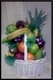 Our Bountiful Fruit Basket Our Bountiful Fruit Basket - Our Bountiful Fruit Basket is filled with the freshest fruit available. It includes a pineapple, grapefruit, oranges, red delicious apples, granny smith apples, pears, kiwi fruit, mango, and other fruits (all dependent upon availability). We can add candy, coffees, teas, chocolates etc. The picture shown is our deluxe basket. Smaller sizes, starting at $55.00 are available! ( just ask) Perfect for sympathy for the home.