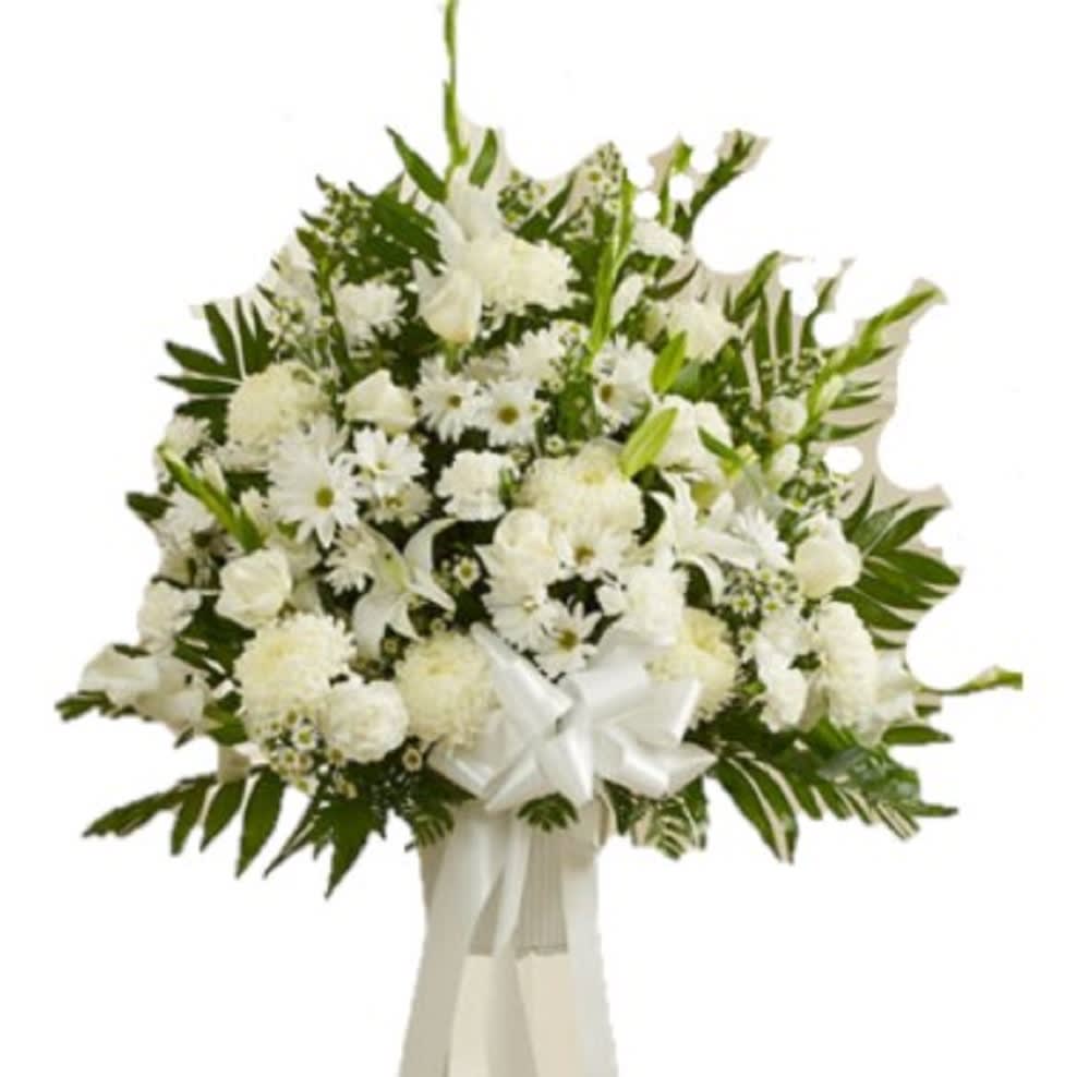 Traditional All White Sympathy Basket Traditional All White Sympathy Basket - Our White Sympathy Standing Basket contains a fresh selection of lilies, mums, and other blooms that convey your condolences.