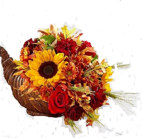 The Fall Harvest Cornucopia The Fall Harvest Cornucopia - Especially Yours proudly presents our Fall Harvest Cornucopia. Capture the essence of the autumn season with this inspiring and colorful arrangement. Rich red roses, bright and beautiful sunflowers, bronze daisies, yellow Peruvian Lilies, and burgundy carnations are perfectly arranged in a natural cornucopia basket that speaks of harvest traditions and treasured family gatherings with each gorgeous bloom. A wonderful Thanksgiving centerpiece or hostess gift!