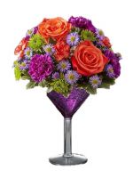 The Spooky Ghost Martini The Spooky Ghost Martini - We’re shaking things up for Halloween with our Spooky Ghost cocktail creation! It’s the perfect mix of vibrant orange and purple blooms inside an oversized martini glass. Colorful and totally unique, it’s sure to make Halloween parties and fall celebrations straight-up fun. As Shown large size .