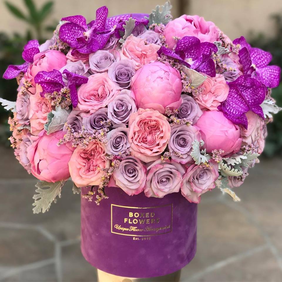 Signature purple velvet box and lush blooms in Glendale, CA Boxed