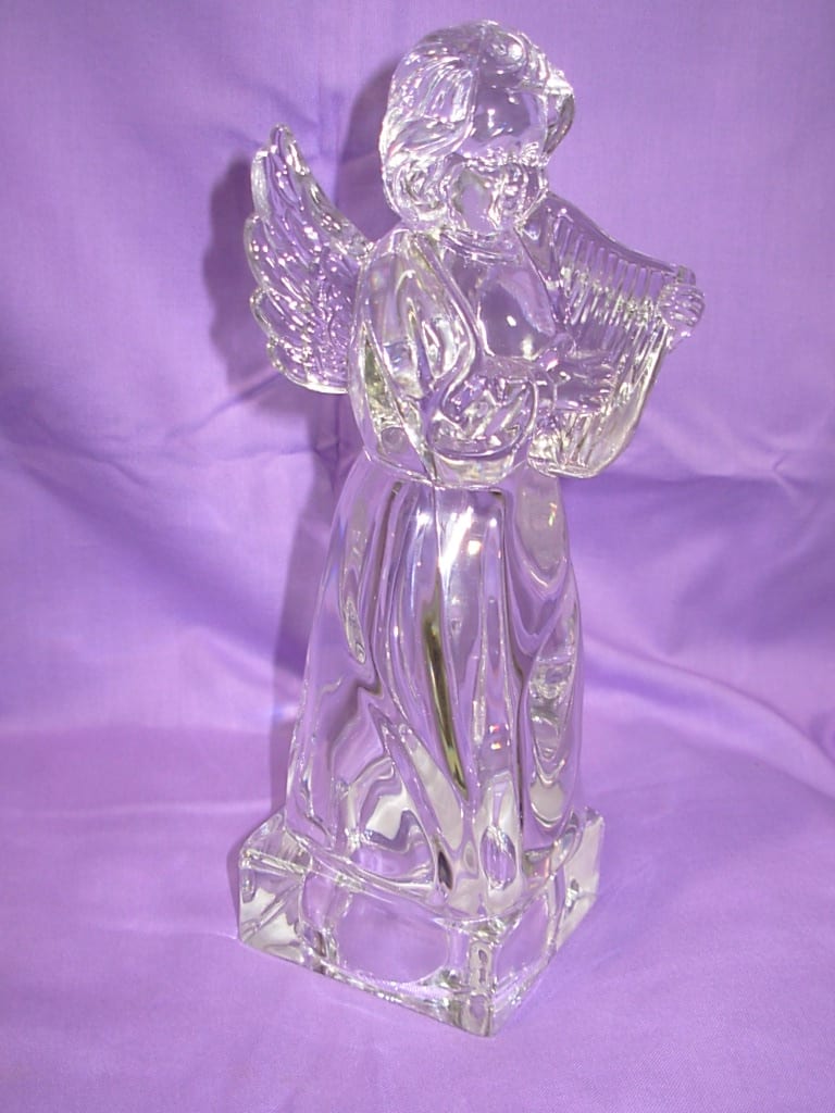 CRYSTAL ANGEL WITH HARP  NEW-G58 - Our German LEAD CRYSTAL ANGEL WITH HARP is 8 inches tall and is 3 inches wide.. This makes a great gift for that angel in your life or for those who collect angels.. We can also incorporate this Crystal Angel as the focal point in a sympathy arrangement for remembrance of a friend or lost love one.. Phone us at 1-800-331-5358 for us to incorporate this angel in your special floral design.. 