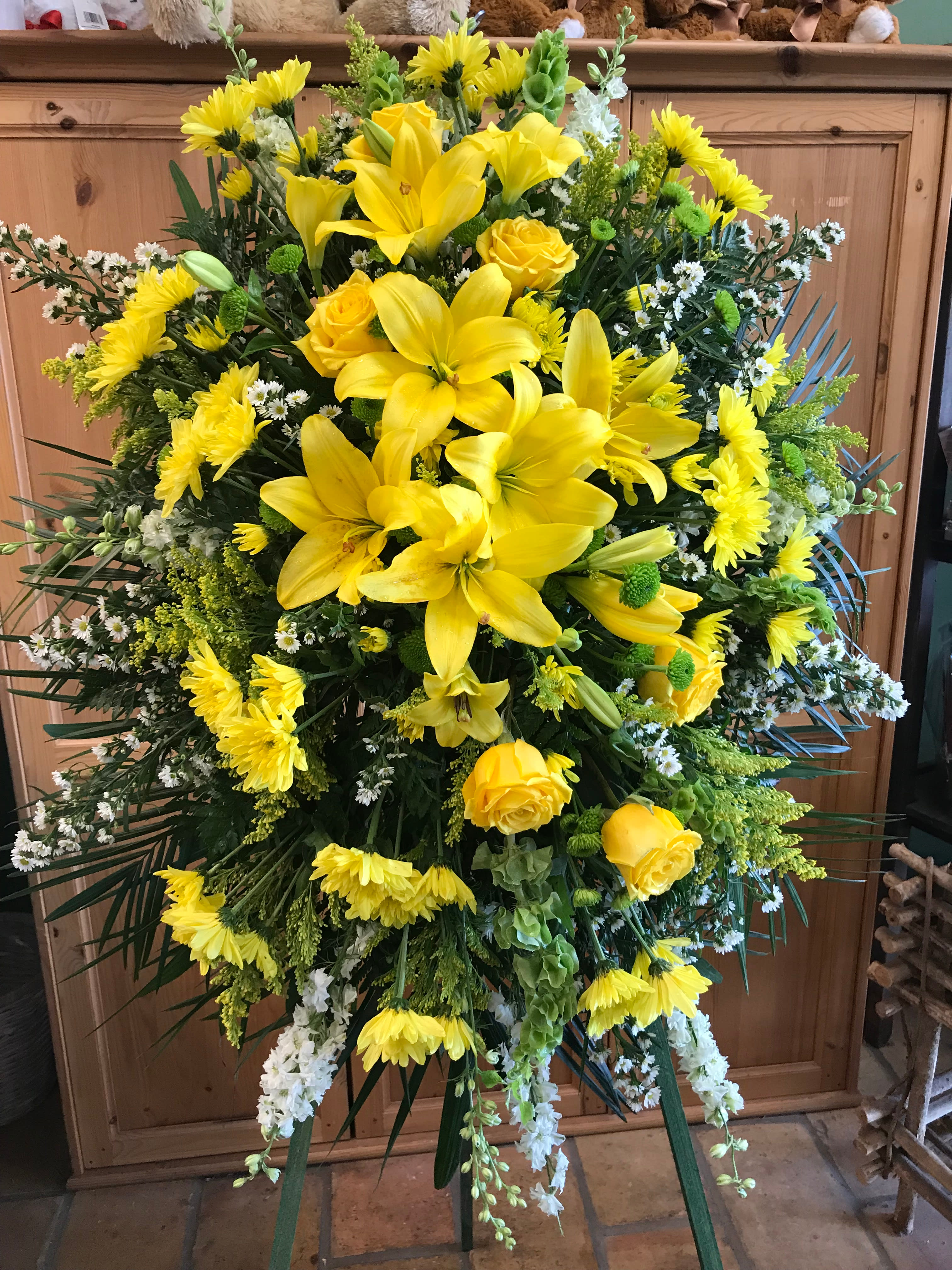 Yellow and White Standing Spray - Standing Spray of mixed yellow and white flowers.