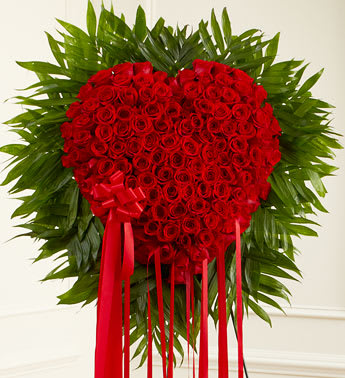 Red Rose Bleeding Heart - Product ID: 91281   When words arenât enough to express the depths of your love, this heart-shaped arrangement makes an unforgettable statement and a stunning tribute. Crafted from 150 fresh red roses in a solid heart Traditionally sent by immediate family and delivered directly to the funeral home Measures approximately 36&quot;H x 38&quot;W without the stand Only the freshest flowers are used, so colors and varieties may vary