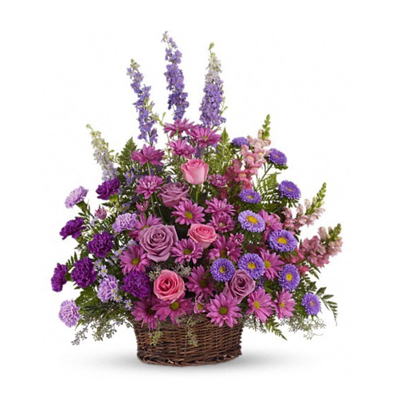 Gracious Lavender Basket Gracious Lavender Basket - Soothing lavender, respectful purple and compassionate pinks are combined beautifully in this basket overflowing with pretty flowers, sincerity and sympathy. A lovely way to share your thoughts and pay tribute to someone special. A profusion of purple, pink and lavender blooms such as roses, carnations, larkspur, matsumoto and monte cassino asters and much more are delivered in a round wicker basket. Orientation: One-Sided All prices in USD ($) Standard T235-1A