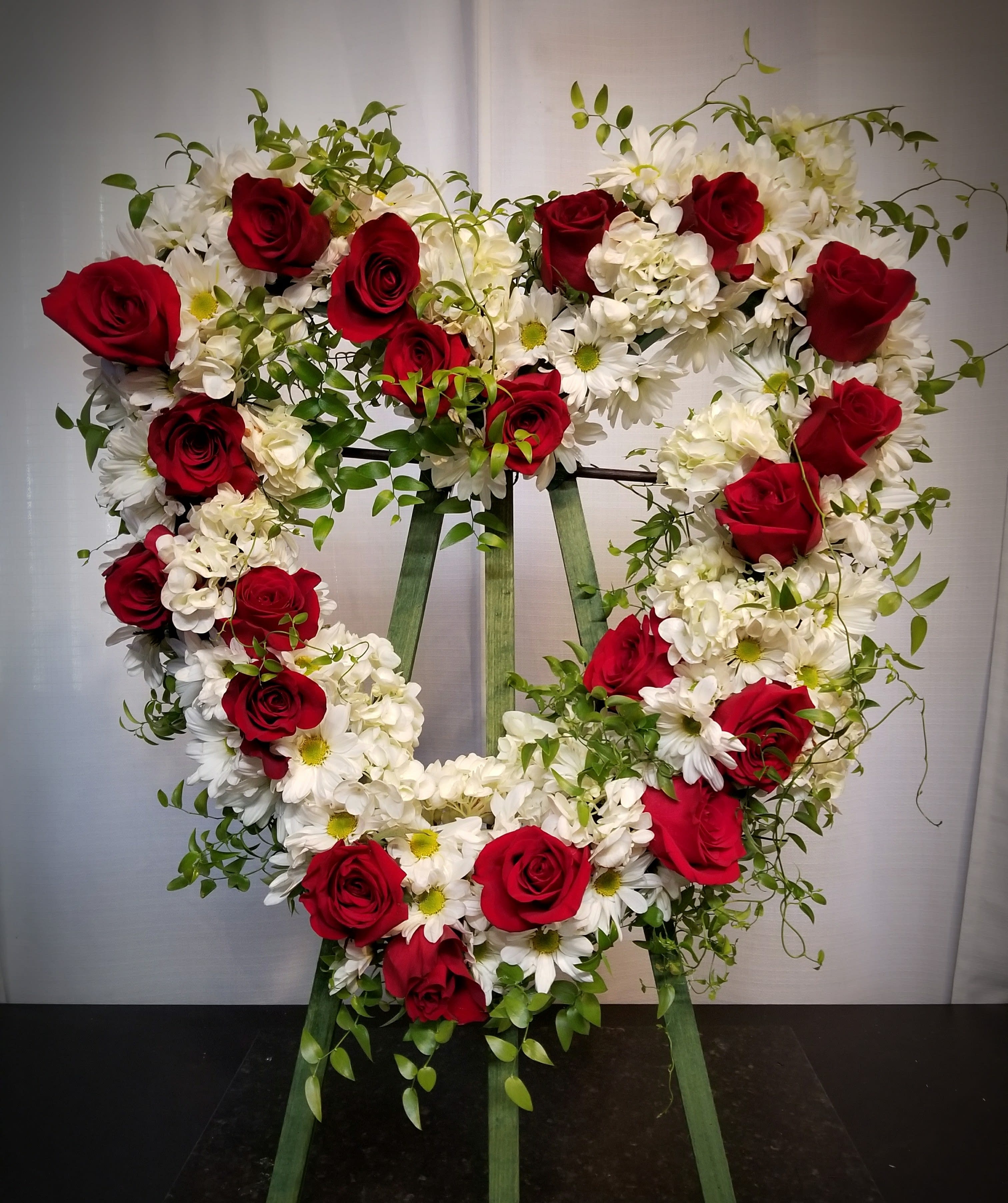 Sentimental Heart - The beauty of the heart symbol is forever.....send this as a token of your lasting memories.  The base of the heart is a 24&quot; frame
