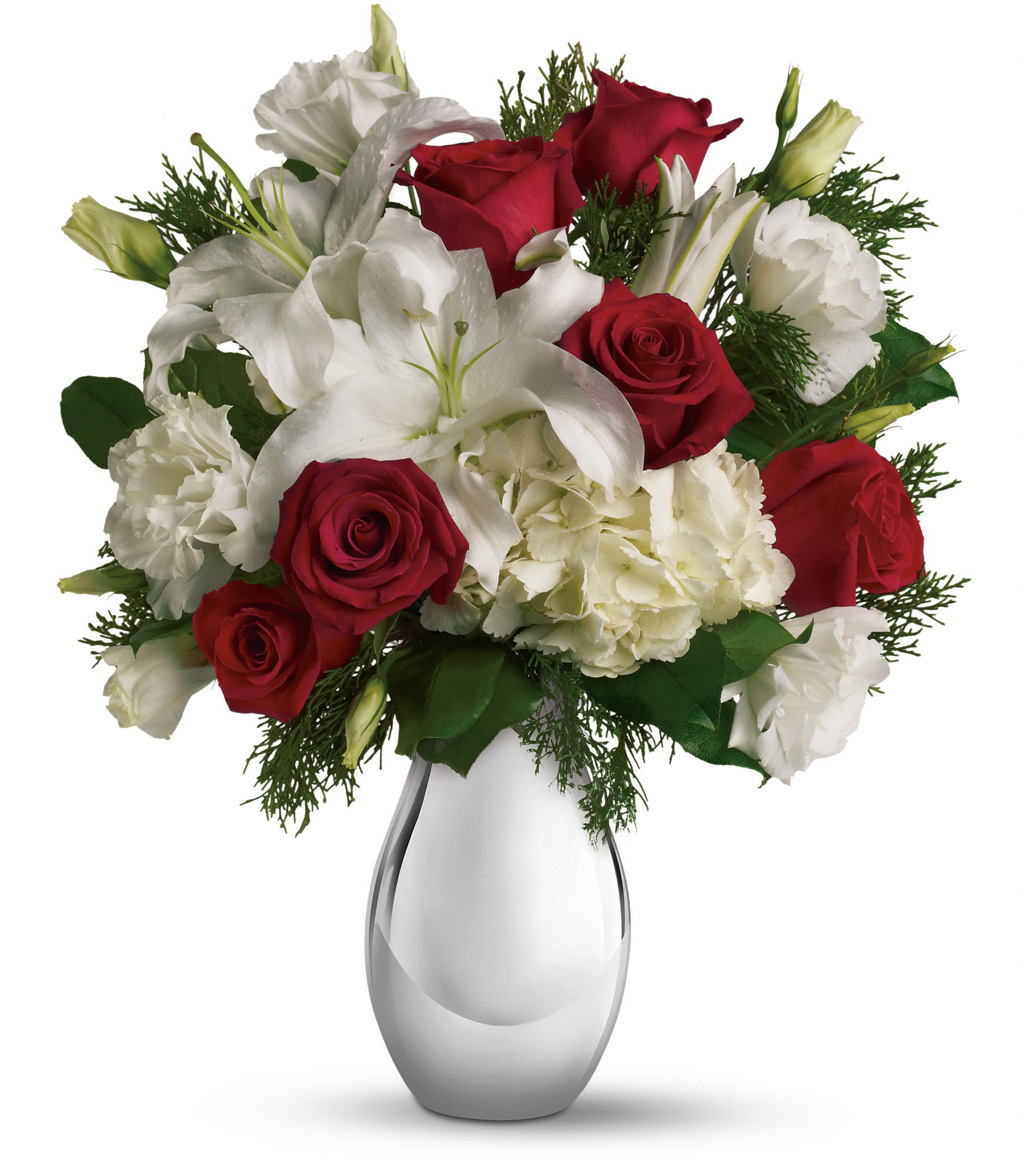 Teleflora's Silver Noel Bouquet - The lovely Christmas bouquet includes white hydrangea, red roses, white oriental lilies and white lisianthus accented with flat cedar. Approximately 14 1/2&quot; W x 17&quot; H.  T406-1A