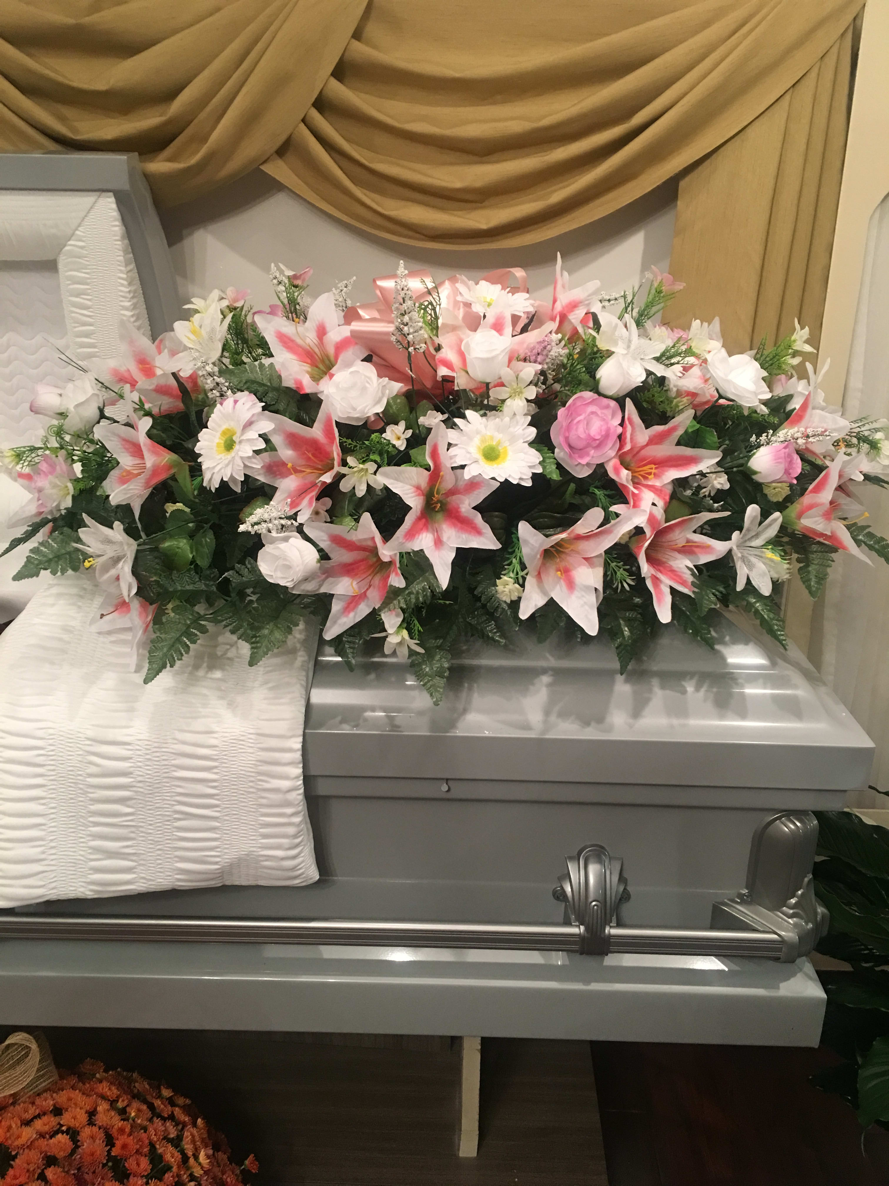 Ladies Pink Casket Spray In Greenwood Sc Designer Flowers By Rose