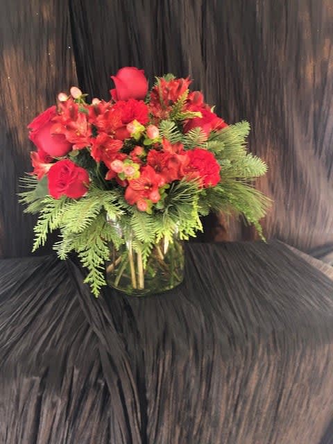 Hope for the holidays Hope for the holidays - Assortment of red roses, carnations, alstromeria with assorted evergreens