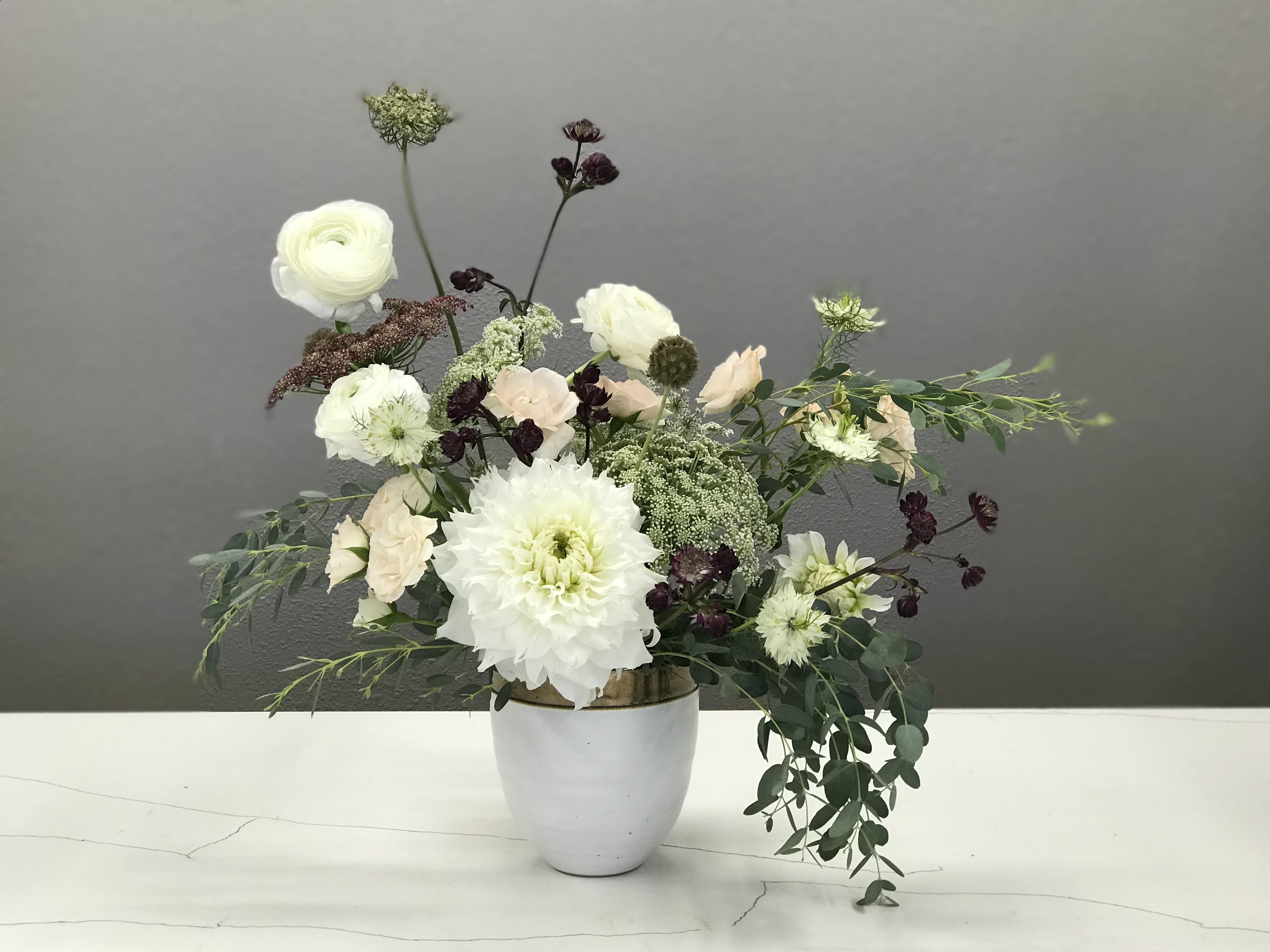 Emphatically Yours - Designed for the unique love in your life- celebrate them with this elegantly arranged floral hug featuring premium blooms. 