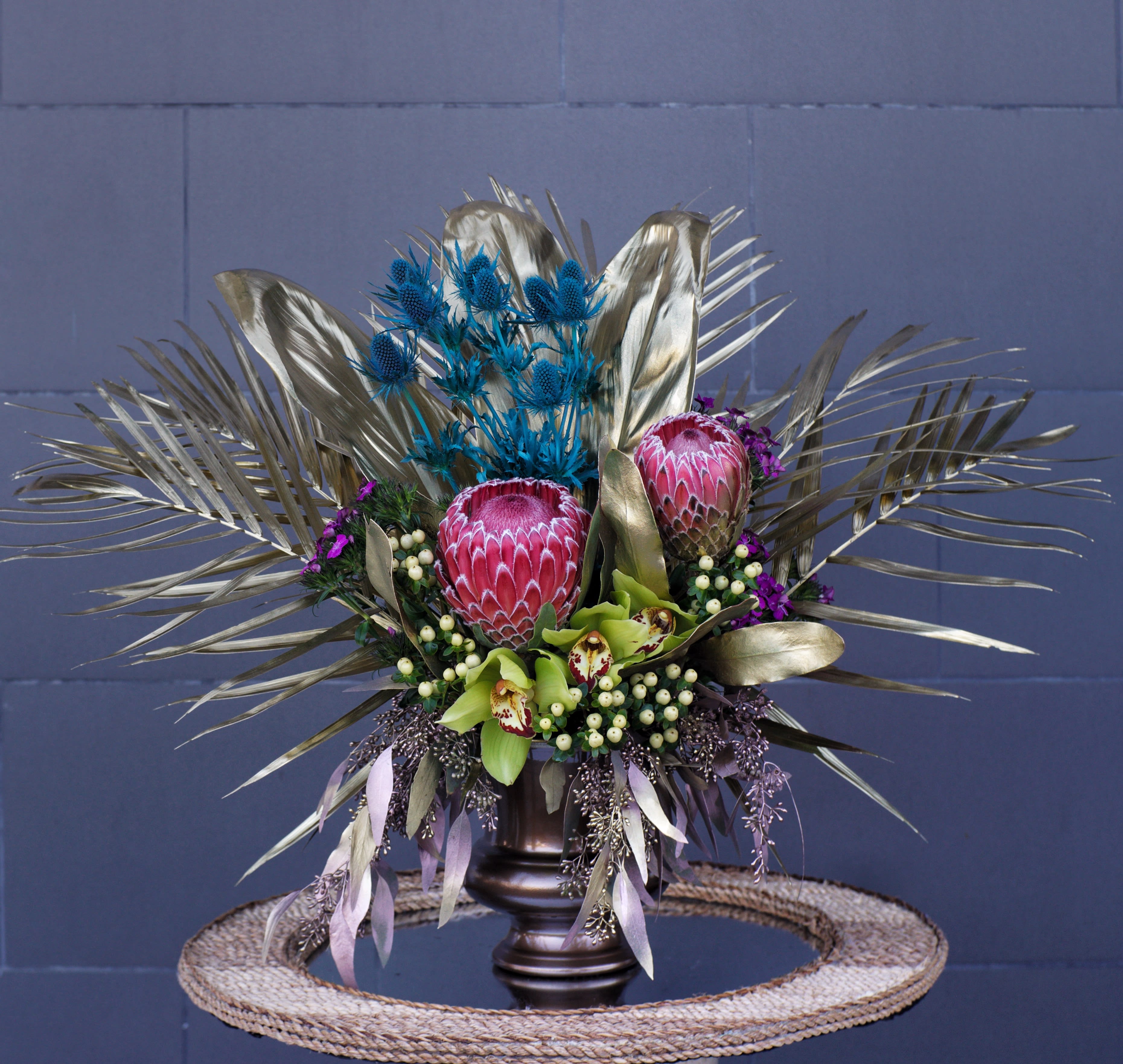 Golden Wings - This design including exotic tropical flowers and accents is a good gift for all occasion.