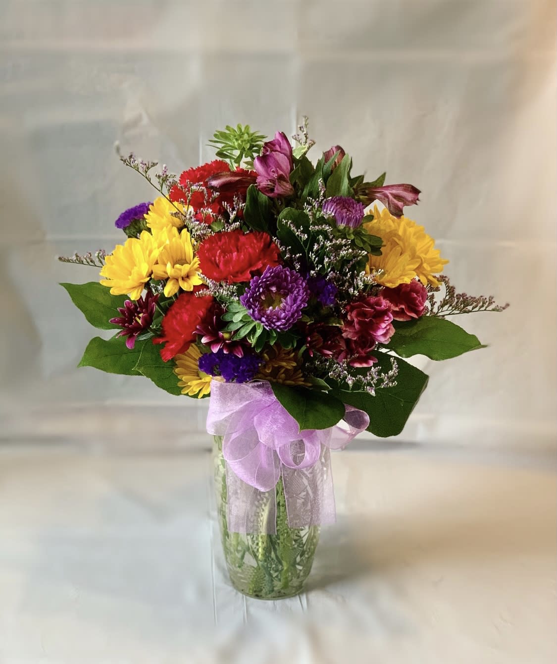 Spring Bliss  - This gorgeous mix of spring blossoms is sure to bring some sunshine to your someone special. Perfect for any occasion! 