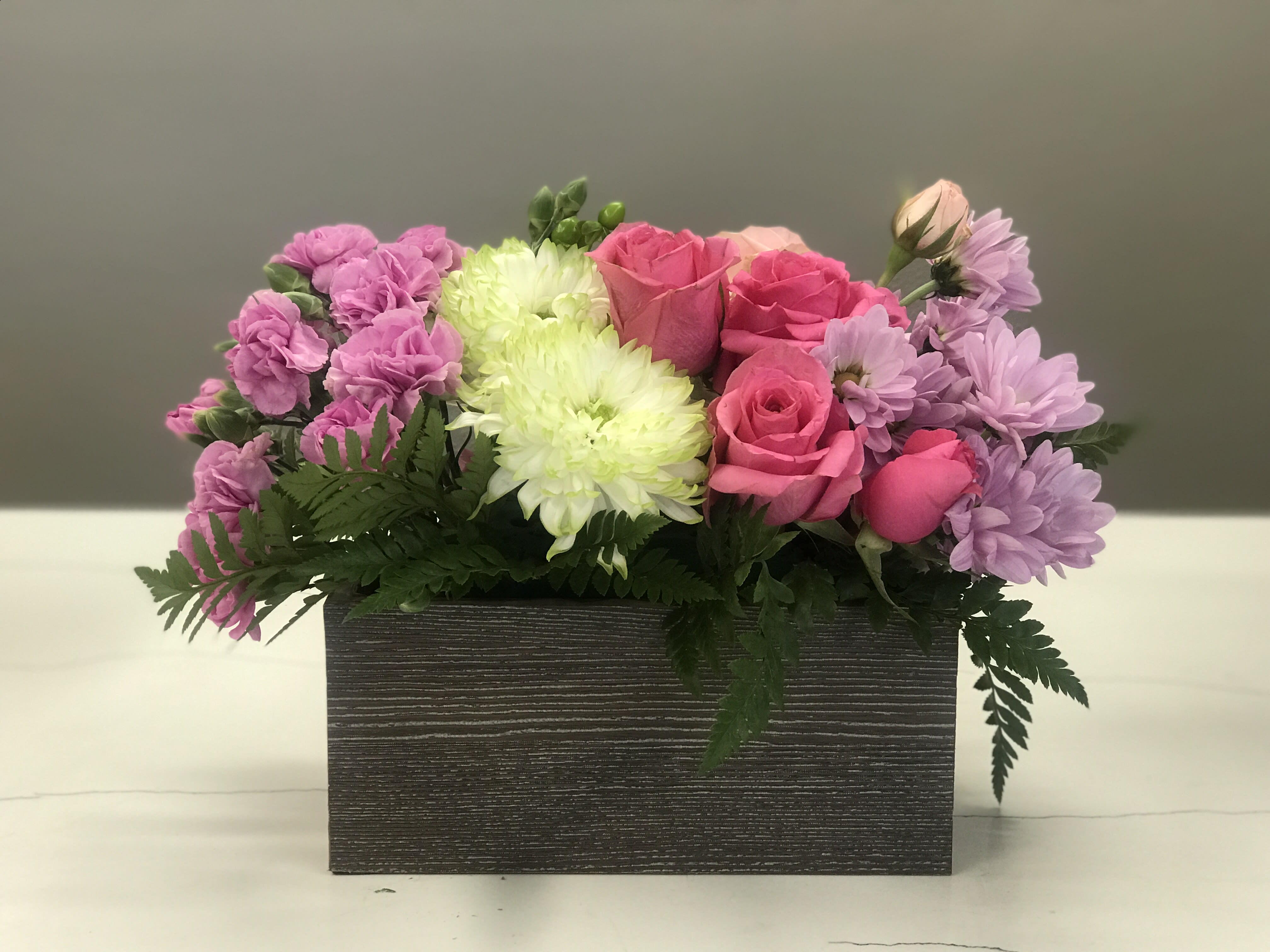 Windowsill Stunner - Full of pinks and lavender this flower box is here to bring happiness and life into your home no matter what season in life or otherwise...
