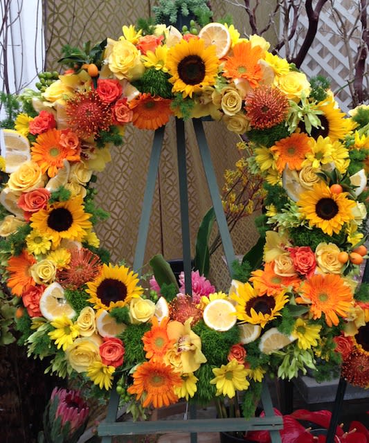 Sunshine in our lives... Sunshine in our lives... - Vibrant easel wreath for a Celebration of life. Incredibly joyful combination of floral and citrus. Sunflowers,lemons, crisp foliage,hydrangea,roses, daisy, gerbera daisy,pin cussions, orchids
